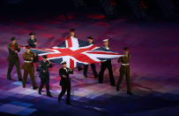 LONDON, ENGLAND - AUGUST 29: Servicemen and women from the Army, Royal Navy and Royal Air Force carry the Union Flag during the Opening Ceremony of the London 2012 Paralympics at the Olympic Stadium on August 29, 2012 in London, England. (Photo by Scott Heavey/Getty Images)