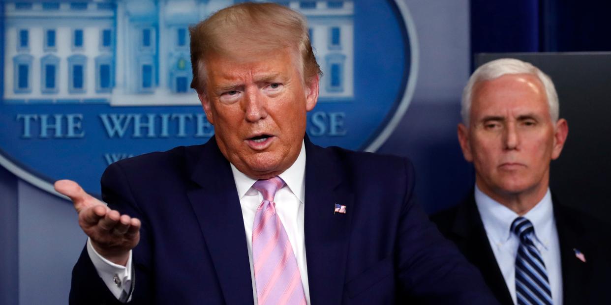 President Donald Trump speaks about the coronavirus in the James Brady Press Briefing Room of the White House, Wednesday, April 1, 2020, in Washington, as Vice President Mike Pence listens. (AP Photo/Alex Brandon)