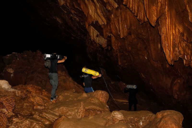 Rescuers navigating a perilous 2.5 mile stretch of narrow, flooded tunnels have saved eight of the 13 members of a soccer team trapped in a Thai cave. (Getty)