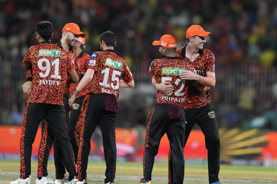 Sunrisers Hyderabad's captain Pat Cummins, right, and teammates celebrate after winning their Indian Premier League second qualifier cricket match against Rajasthan Royals in Chennai, India, Friday, May 24, 2024. (AP Photo /Mahesh Kumar A.)