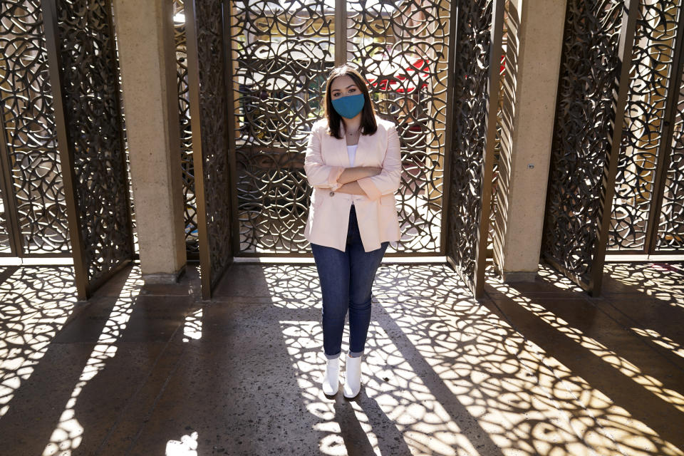 Natalie Naranjo-Morett stands for a portrait Monday, April 19, 2021, in San Diego. "I've started to look for jobs," said Natalie Naranjo-Morett, who will graduate in June with a history degree from the University of California San Diego. "I want to go into museum work, but that's become very difficult because of the pandemic." (AP Photo/Gregory Bull)