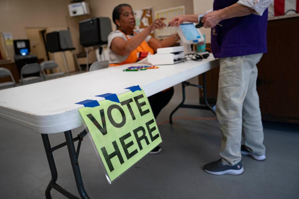 A voter checks in at polling location during the South Carolina Democratic Primary on February 3, 2024, in Orangeburg, South Carolina. (AFP via Getty Images)