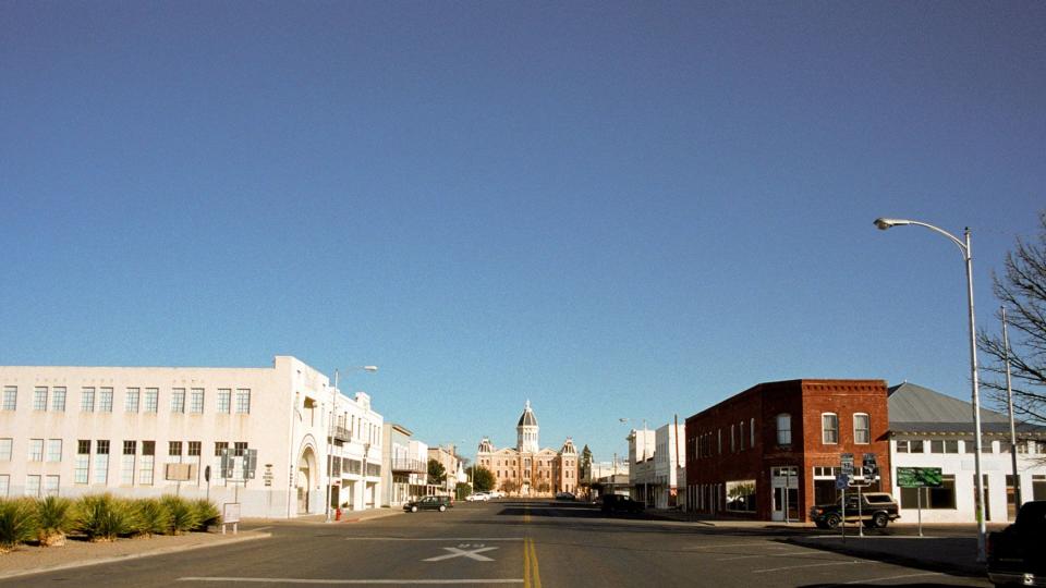 Main road through Marfa, Texas with view of county courthouse