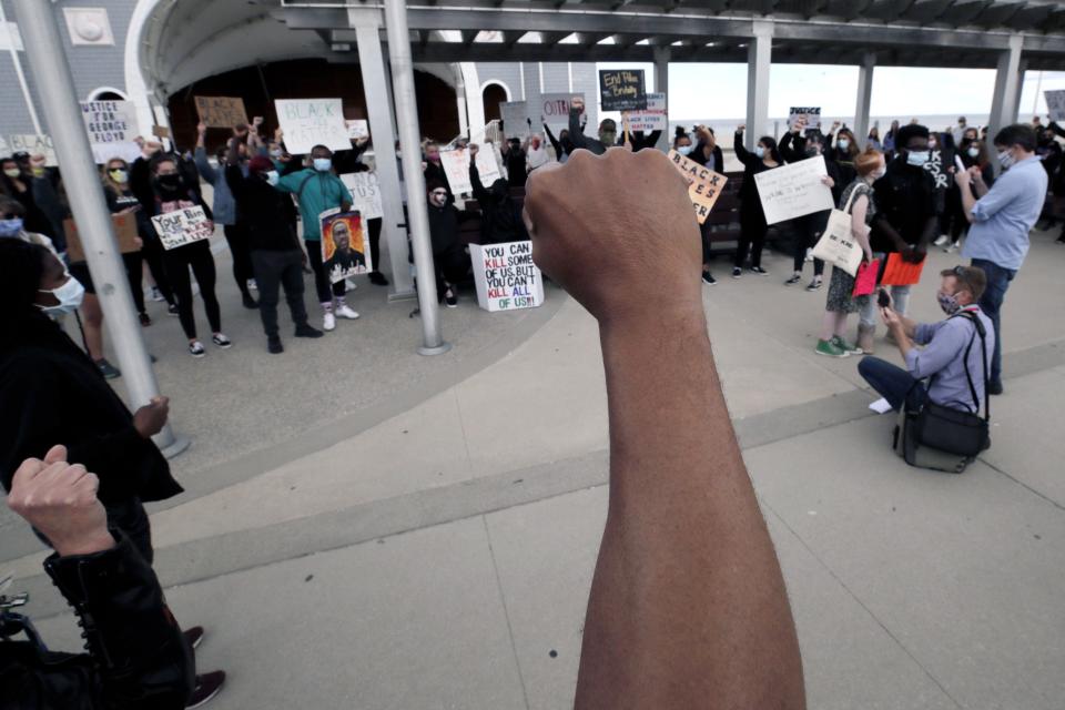 People gather to protest in Hampton Beach, New Hampshire, on June 1 following the police killing of George Floyd in Minneapolis. (Photo: Charles Krupa/Associated Press)