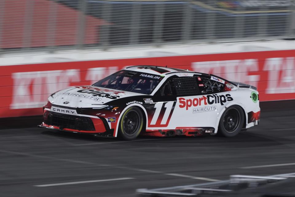 Denny Hamlin (11) drives during the Busch Light Clash NASCAR exhibition auto race at Los Angeles Memorial Coliseum Saturday, Feb. 3, 2024, in Los Angeles. (AP Photo/Mark J. Terrill)