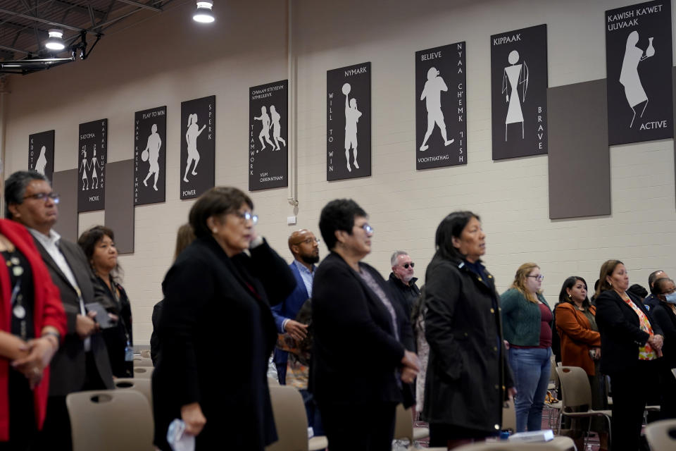 Residents of Gila River Indian Community listen during a "Road to Healing" event, Friday, Jan. 20, 2023, at the Gila Crossing Community School in Laveen, Ariz. The "The Road to Healing," is a year-long tour across the country to provide Indigenous survivors of the federal Indian boarding school system and their descendants an opportunity to share their experiences. (AP Photo/Matt York)