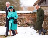 Queen Elizabeth and Prince Philip make the winter trek to church in Jan. 2010.