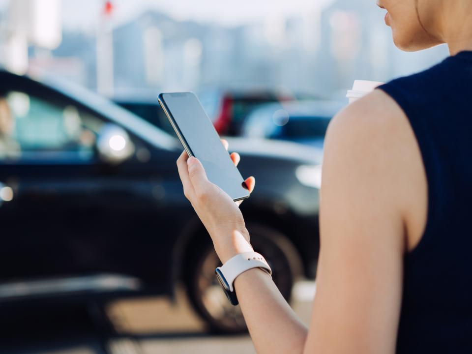 A person waiting for a rideshare.