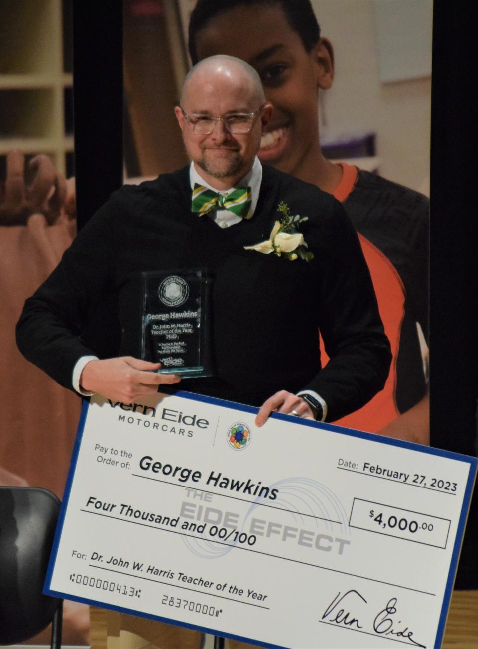 George Hawkins accepts his 35th Annual Dr. John W. Harris Teacher of the Year award on Feb. 27, 2023 at Ben Reifel Middle School.