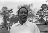 FILER - This is a 1974 file photo showing golfer Lee Elder. Lee Elder was already 40 years old when he made history as the first Black player to tee off at the Masters, so many of his prime years squandered by the scourge of racism. (AP Photo/File)