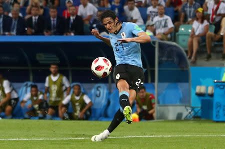 Soccer Football - World Cup - Round of 16 - Uruguay vs Portugal - Fisht Stadium, Sochi, Russia - June 30, 2018 Uruguay's Edinson Cavani scores their second goal. REUTERS/Hannah Mckay