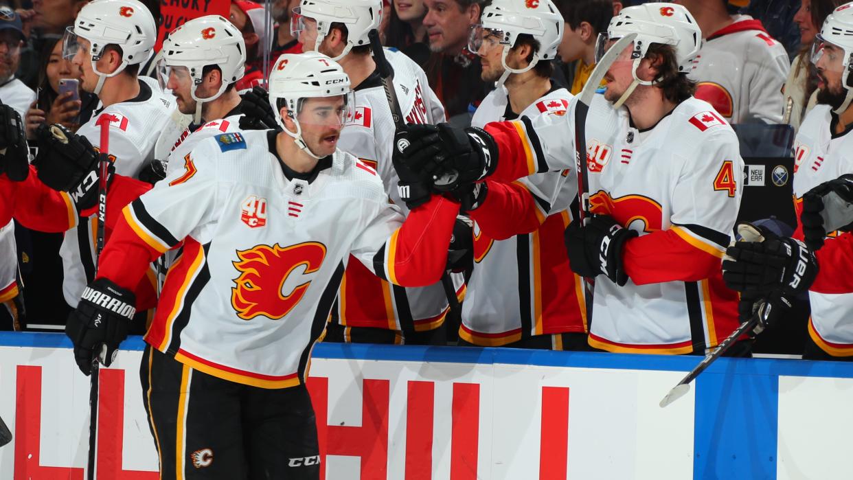 After collapsing during a practice earlier this season, Calgary Flames defenceman TJ Brodie scores his first goal of the season. (Photo by Sara Schmidle/NHLI via Getty Images)