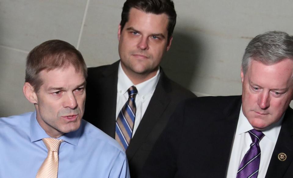 Reps. Jim Jordan (R-Ohio), left, Gaetz and Mark Meadows (R-N.C.), right, speak to reporters outside the House Intelligence Committee offices. (Photo: Jonathan Ernst / Reuters)