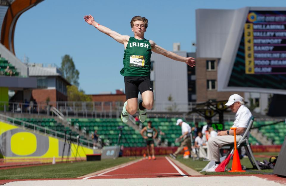 Sheldon’s Owen Phillips competes in the boys long jump during the Oregon Relays at Hayward Field Friday, April 19, 2024.