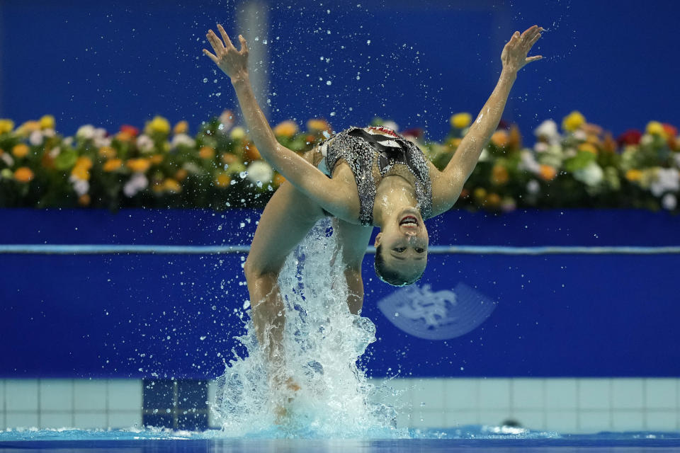 Silver medalists Japan's Moe Higa and Mashiro Yasunaga takes part in the Free Routine segment of the Artistic Swimming Women's Duet competition at the 19th Asian Games in Hangzhou, China, Saturday, Oct. 7, 2023. (AP Photo/Ng Han Guan)