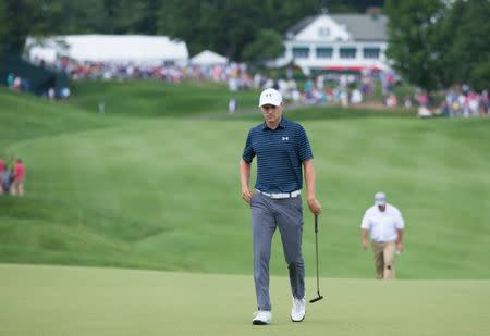 Jun 25, 2017; Cromwell, CT, USA; Jordan Spieth walks onto the first green with the clubhouse in the background during the final round of the Travelers Championship golf tournament at TPC River Highlands. Mandatory Credit: Bill Streicher-USA TODAY Sports
