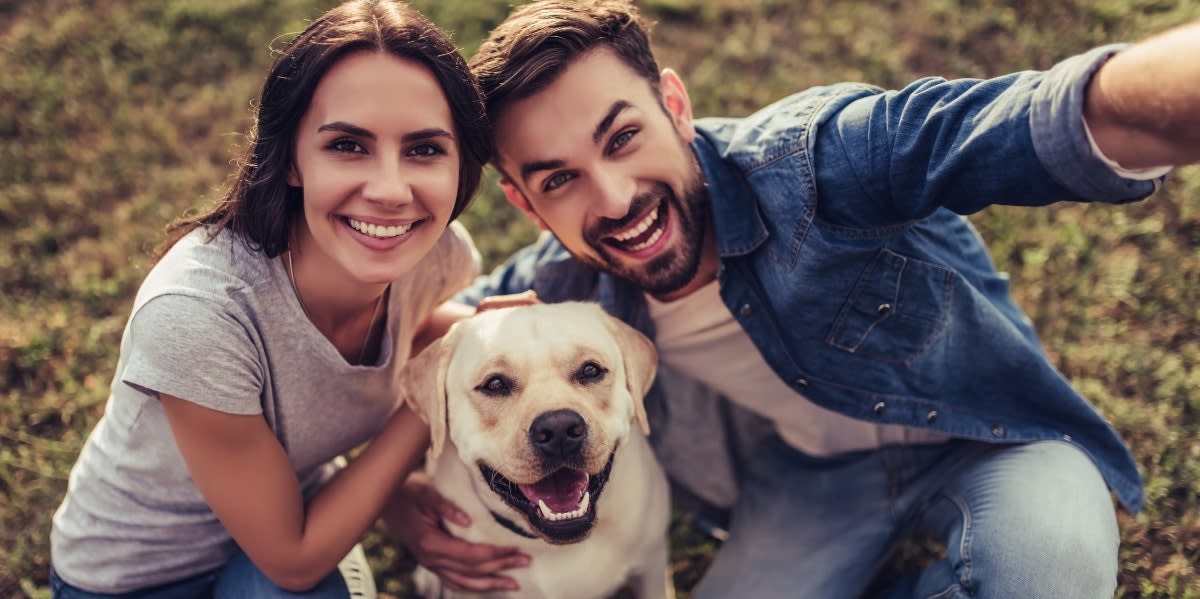 couple with dog