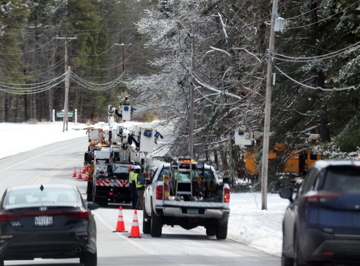 Line crews continue to work on restoring power on Route 4 in Sanford as well as many other streets on Monday, March 25, 2024, after an ice storm blew out power on Saturday night in the Seacoast.