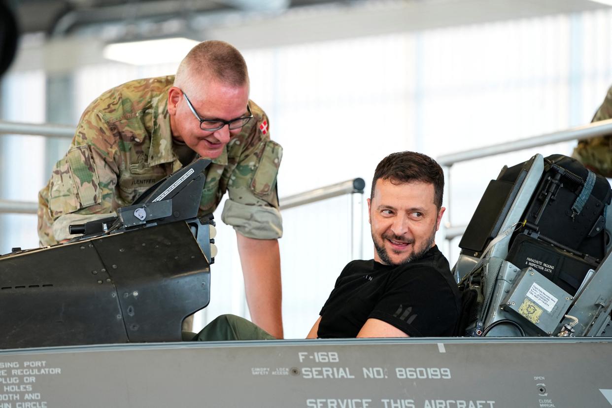 Ukrainian President Volodymyr Zelenskiy sits in an F-16 fighter jet at Skrydstrup Air Base in Vojens (via REUTERS)