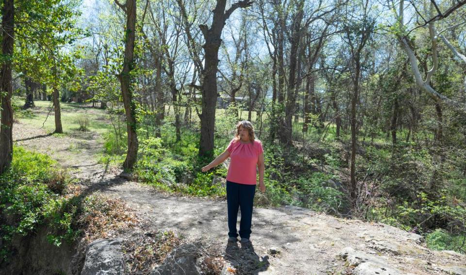 Sandy Randel, director of the Etzanoa Conservancy in Arkansas City, points to a ravine where Escanjaques warriors hid during a 1601 battle with Spanish conquistadors near the Native American town of Etzanoa.