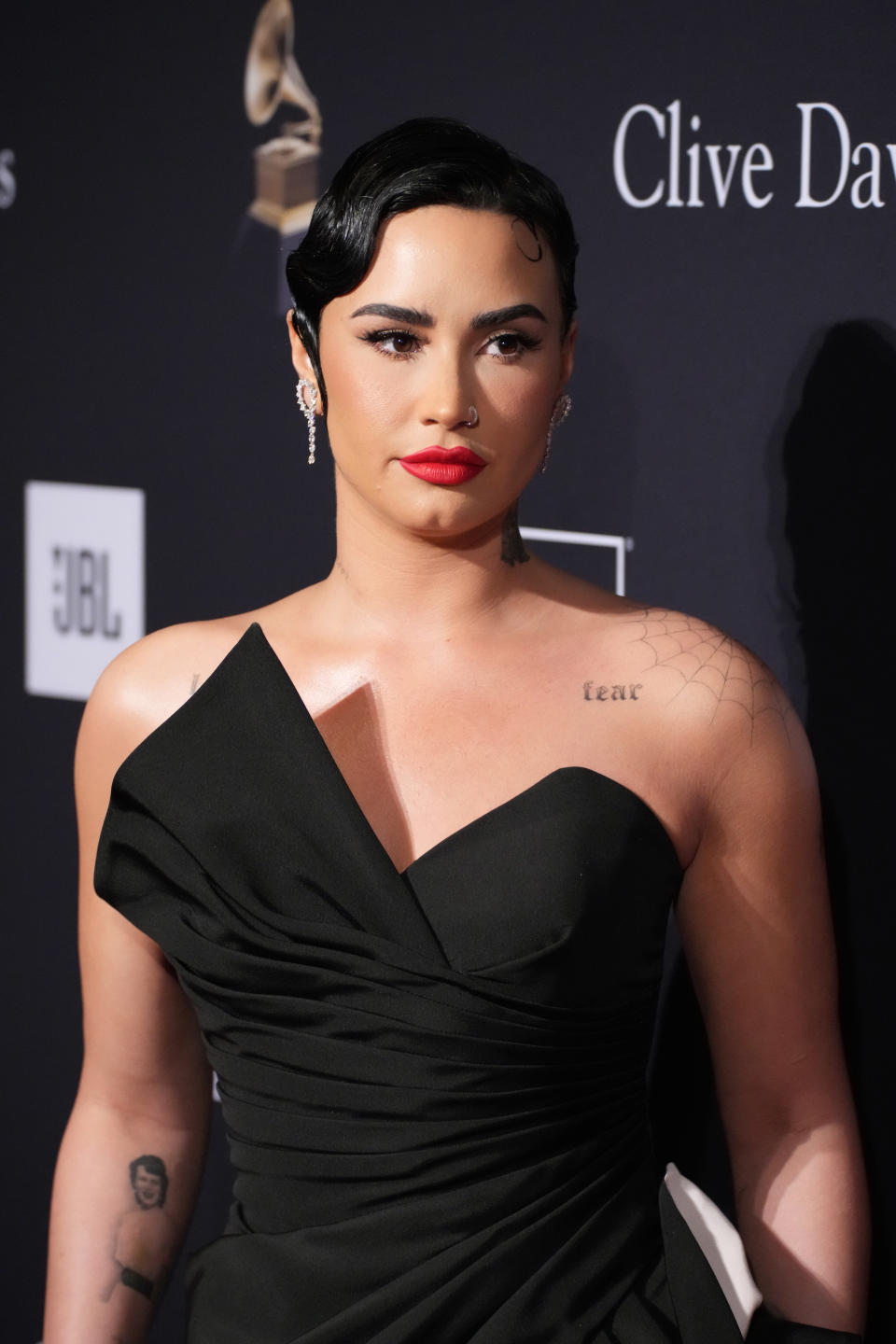 Close-up of Demi at a media event