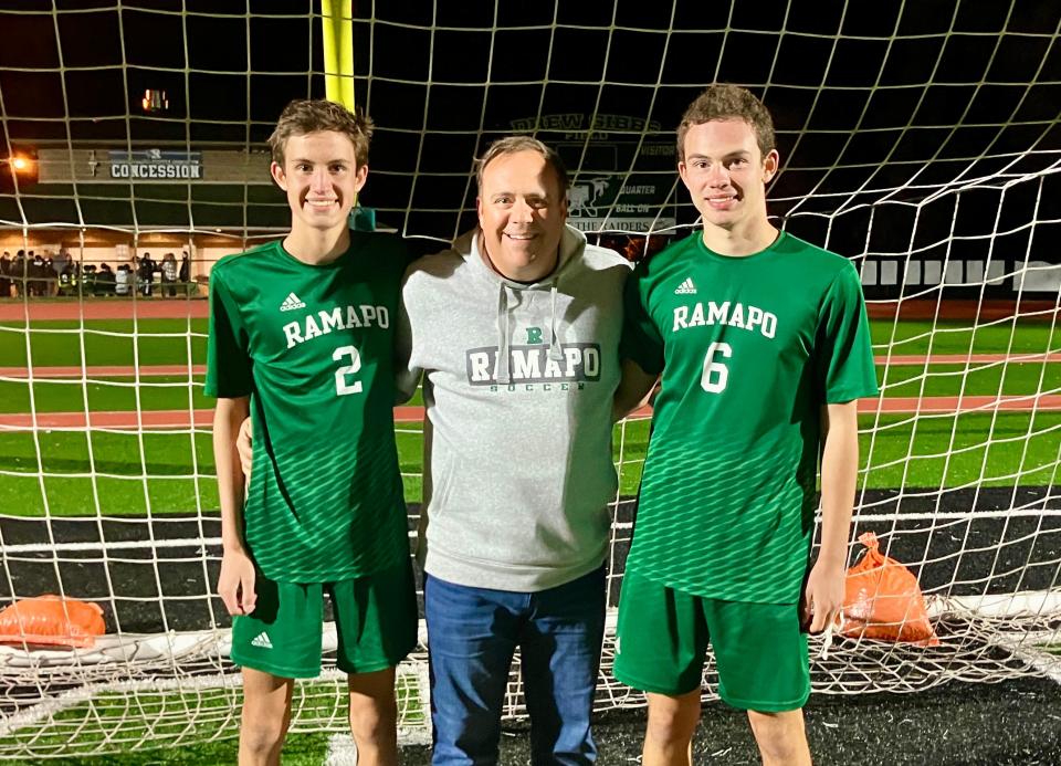 Ramapo brothers James (2) and Andrew Fitzmaurice (6) are pictured with their father Dave, who was a four-year varsity soccer player for the Raiders.