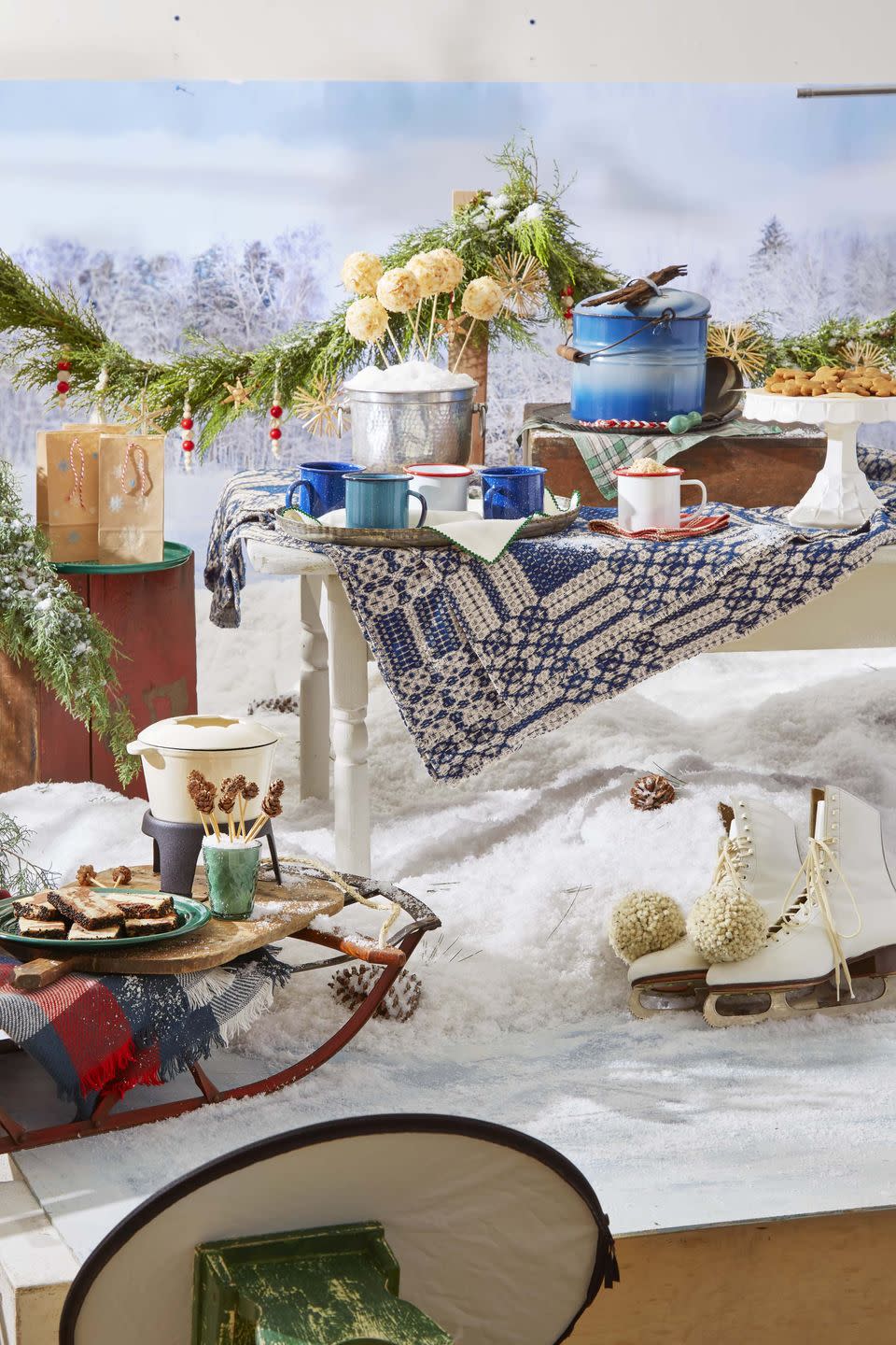 <p>Gather your friends for some winter revelry. Embrace the cold weather and serve up some <a href="https://www.countryliving.com/food-drinks/a38092639/hot-buttered-rum-with-coconut-vanilla-ice-cream-balls-recipe/" rel="nofollow noopener" target="_blank" data-ylk="slk:Hot Buttered Rum with Vanilla Ice Cream Balls" class="link ">Hot Buttered Rum with Vanilla Ice Cream Balls</a> and your favorite <a href="https://www.countryliving.com/food-drinks/g647/holiday-cookies-1208/" rel="nofollow noopener" target="_blank" data-ylk="slk:Christmas cookies" class="link ">Christmas cookies</a> for an ice-skating party. No snow? No problem. Throw on a scarf and make it a porch party.</p>