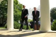 U.S. President Barack Obama (L) and Vice President Joe Biden depart after announcing the restoration of diplomatic ties with Cuba in the Rose Garden at the White House in Washington July 1, 2015. Obama said on Wednesday the United States had agreed to the historic step of re-establishing diplomatic relations with Cuba and will raise its flag over a U.S. Embassy in Havana later this summer. REUTERS/Jonathan Ernst