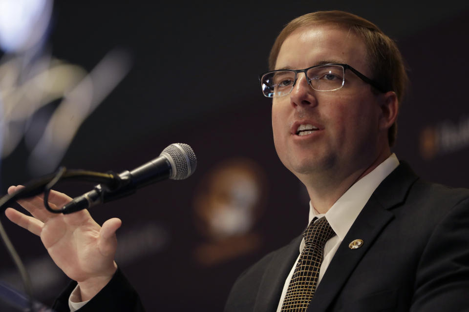 FILE - In this Dec. 10, 2019, file photo, Eliah Drinkwitz is introduced as the new head football coach at the University of Missouri, in Columbia, Mo. Drinkwitz already has experienced just about everything a college football coach could imagine in his first season. Except for playing a game. That will finally change on Sept. 26, 2020, when the Tigers’ new coach leads his team into the opener of its SEC-only schedule against mighty Alabama. (AP Photo/Jeff Roberson, File)