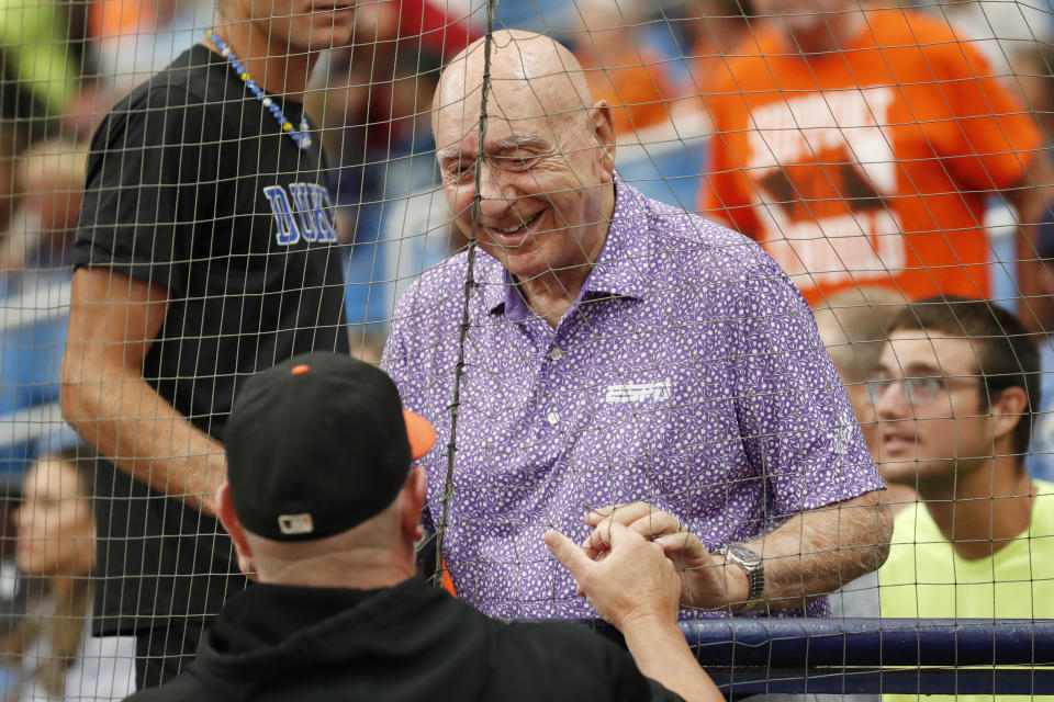 ESPN basketball broadcaster Dick Vitale talks with Baltimore Orioles manager Brandon Hyde before the start of a baseball game against the Tampa Bay Rays, Sunday, July 23, 2023, in St. Petersburg, Fla. (AP Photo/Scott Audette)