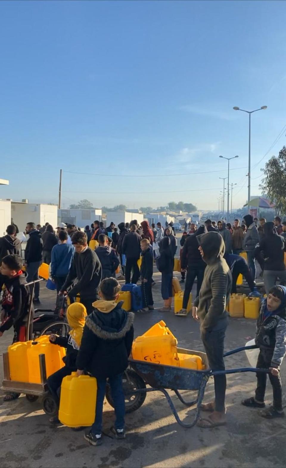 Rafah residents queuing for scarce water supplies (Provided)