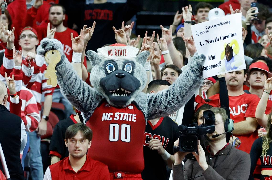 Mr. Wuf cheers on the Wolfpack during the second half of N.C. State’s 77-69 victory over UNC at PNC Arena in Raleigh, N.C., Sunday, Feb. 19, 2023.