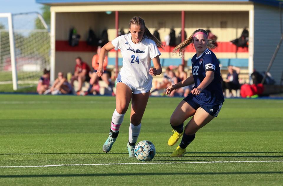 Washburn Rural's Destiny Higgs dribbles the ball against Seaman on Thursday, May 9. Washburn Rural defeated Seaman 1-0.