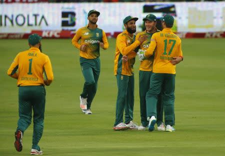 South Africa celebrates the wicket of England's Chris Jordan (not in picture) during the T20 International cricket match in Cape Town, South Africa, February 19, 2016. REUTERS/Mike Hutchings