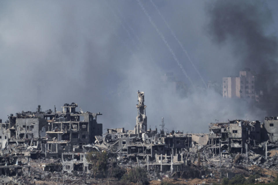 Smoke rises following an Israeli airstrike in the Gaza Strip, as seen from southern Israel, Friday, Nov. 10, 2023. (AP Photo/Leo Correa)