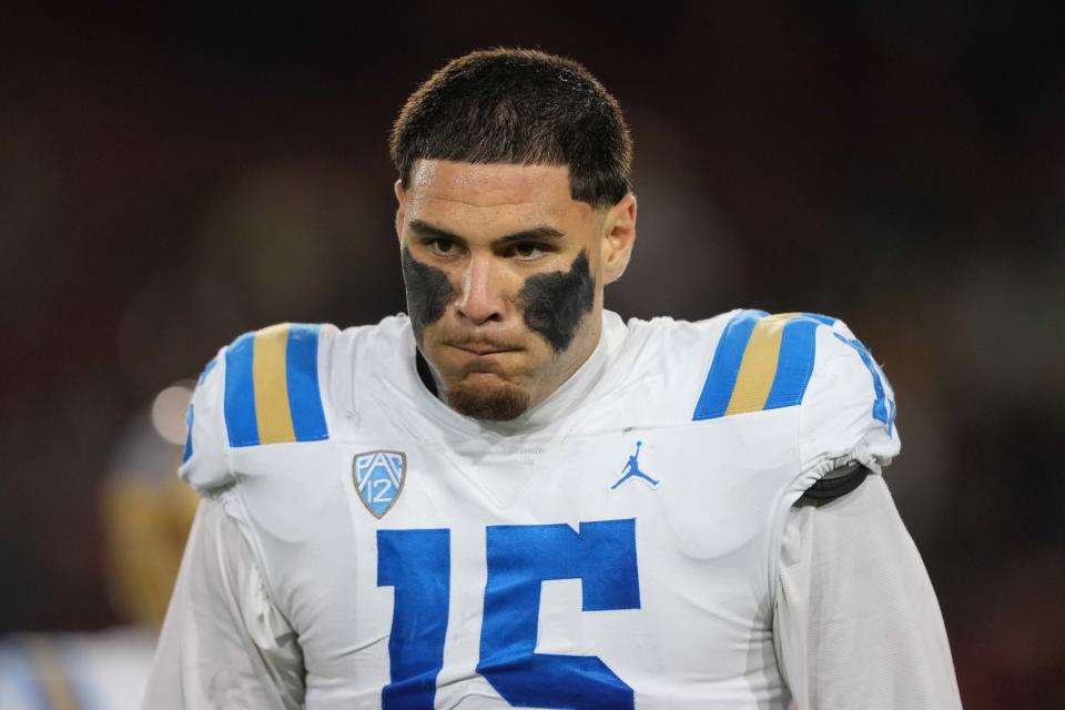 Oct 21, 2023; Stanford, California, USA; UCLA Bruins defensive lineman Laiatu Latu (15) during halftime against the Stanford Cardinal at Stanford Stadium. Mandatory Credit: Darren Yamashita-USA TODAY Sports