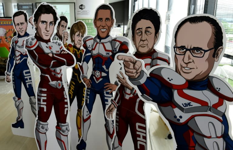 The G7 leaders presented as superheroes at the NGO exhibition building on May 26, 2016 in Ise, where the two-day summit is taking place