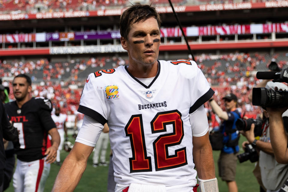 Oct 9, 2022; Tampa, Florida, USA; Tampa Bay Buccaneers quarterback Tom Brady (12) walks off the field after the game against the Atlanta Falcons at Raymond James Stadium. Mandatory Credit: Matt Pendleton-USA TODAY Sports