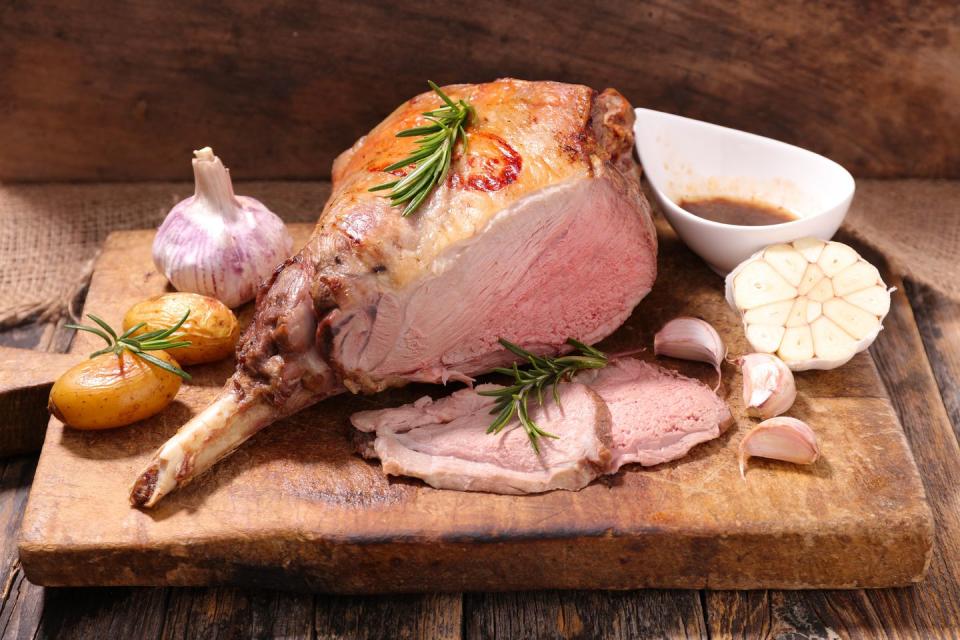 roasted lamb leg on board