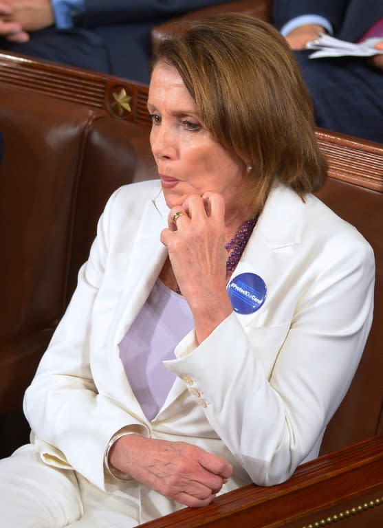 House Minority Leader Nancy Pelosi watches as US President Donald Trump speaks during a joint session of Congress at the US Capitol in Washington, DC on February 28, 2017