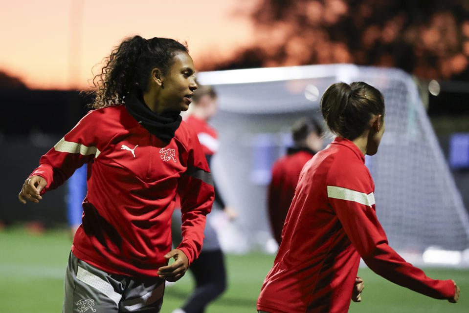 Switzerland's Coumba Sow, left, trains with her team in Hamilton, New Zealand, Monday, July 24, 2023 ahead of the Women's World Cup Group A soccer match between Switzerland and Norway on July 25.(AP Photo/Juan Mendez)
