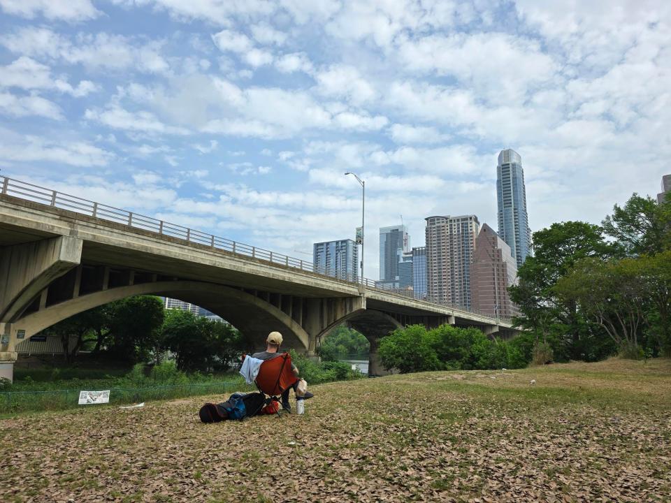 Matt Langbehn, from Round Rock, was up early to snag an eclipse viewing spot by the bat bridge on Congress Ave.