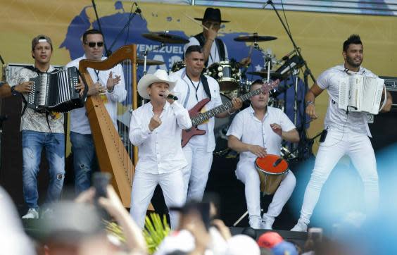 Colombian singer Geovanny Ayala performs during the Venezuela Aid Live concert (AP)