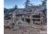Homes are destroyed by suspected military air strikes in the district of Mutraw, also known as Papun, in eastern Myanmar's Karen State, Friday, Jan. 13, 2023. Air strikes this week by Myanmar's military on villages inhabited largely by the Karen ethnic minority killed a number of civilians, and destroyed two churches, two relief organizations said Friday. (Karen Human Rights Group via AP)