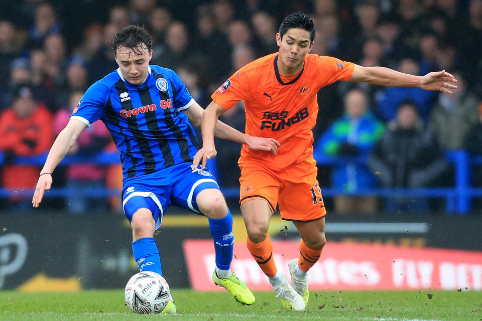 Oliver Rathbone vies with Newcastle United striker Yoshinori Muto. (Credit: Getty Images)