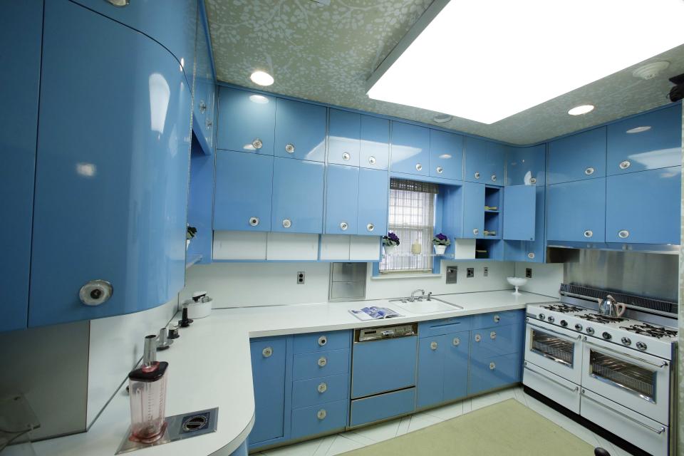 The blue kitchen at the Louis Armstrong House Museum is on display Wednesday, Oct. 9, 2013, in the Queens borough of New York. (AP Photo/Frank Franklin II)
