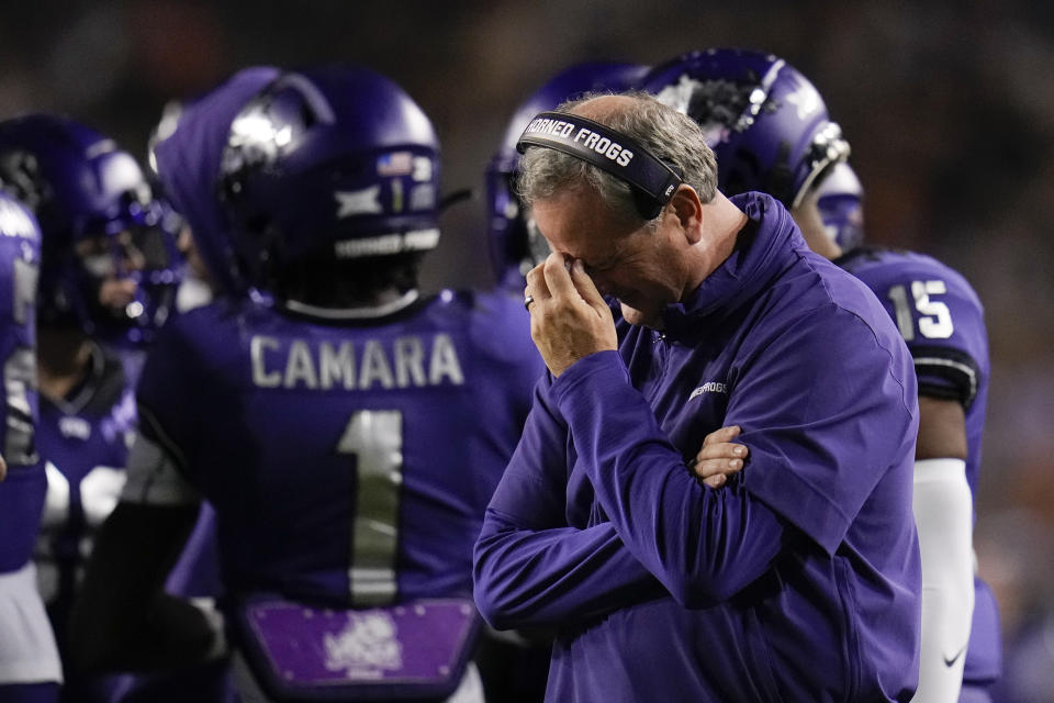 TCU head coach Sonny Dykes reacts during the first half of an NCAA college football game against Texas, Saturday, Nov. 11, 2023, in Fort Worth, Texas. (AP Photo/Julio Cortez)