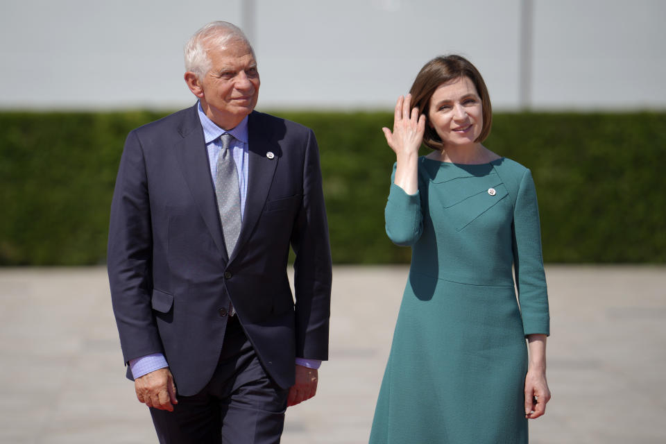 Moldova's President Maia Sandu, right, greets European Union foreign policy chief Josep Borrell as he arrives for the European Political Community Summit at the Mimi Castle in Bulboaca, Moldova, Thursday, June 1, 2023. Leaders are meeting in Moldova Thursday for a summit aiming to show a united front in the face of Russia's war in Ukraine and underscore support for the Eastern European country's ambitions to draw closer to the West and keep Moscow at bay. (AP Photo/Vadim Ghirda)