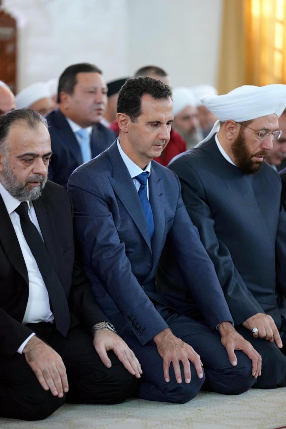 Syria's President Bashar Al-Assad attends Eid al-Adha prayers at a mosque in Damascus (REUTERS)