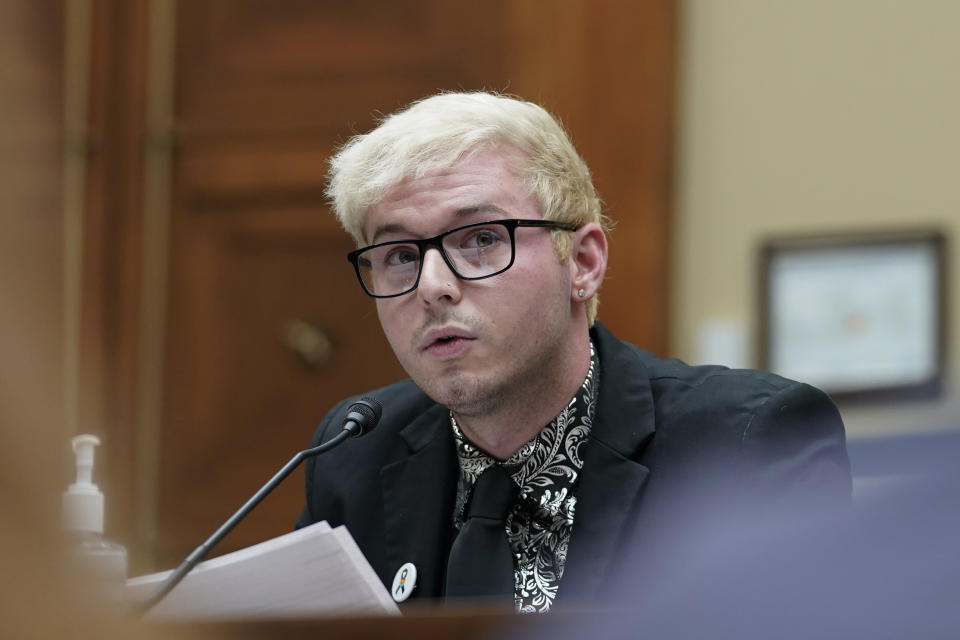 Michael Anderson, survivor of the Club Q shooting, testifies before a House Oversight Committee hearing, Wednesday, Dec. 14, 2022, on Capitol Hill in Washington. (AP Photo/Mariam Zuhaib)